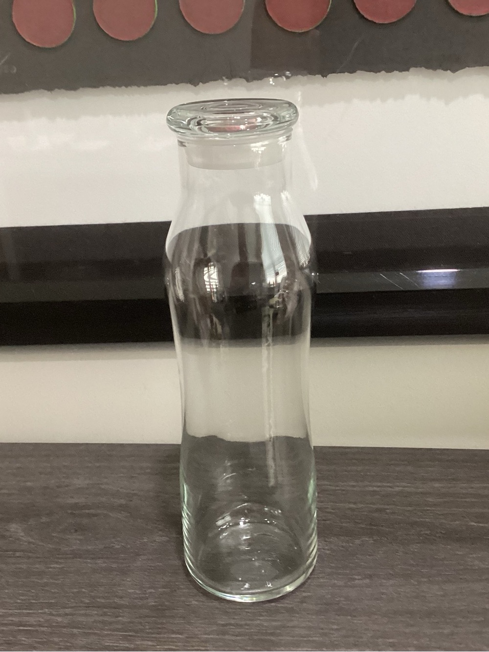 Vtg. 1970s Libby clear glass swerve bottle, used for juices and water.